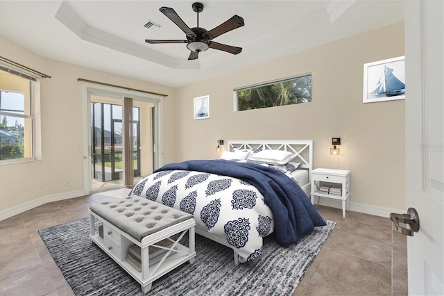 bedroom featuring tile patterned flooring, visible vents, baseboards, a tray ceiling, and access to outside