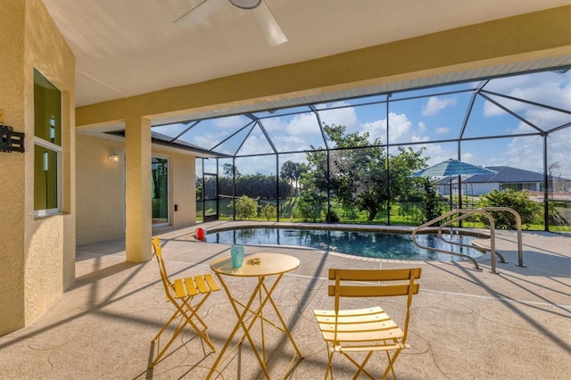 pool with a patio area and a lanai