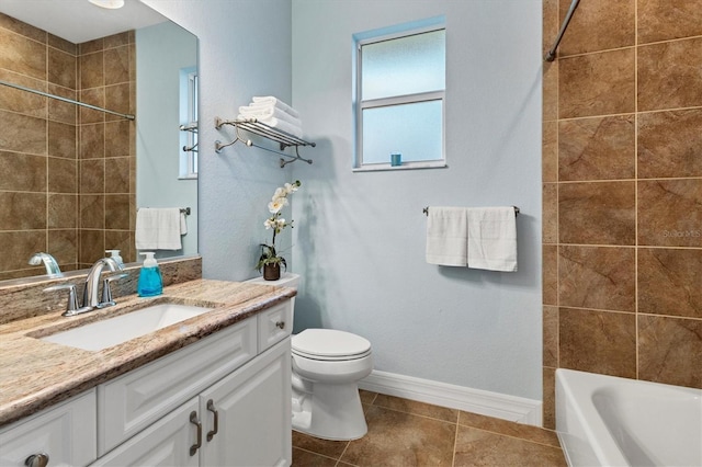 full bath with vanity, tile patterned floors, toilet, and baseboards