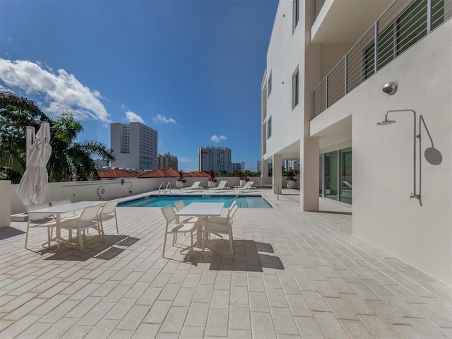 view of pool with a patio area