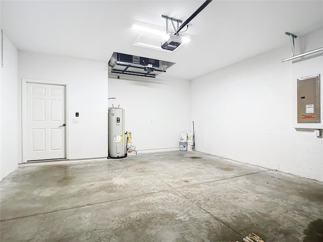 garage featuring a garage door opener, electric panel, and electric water heater