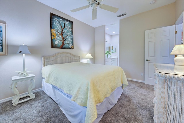 carpeted bedroom featuring connected bathroom and ceiling fan