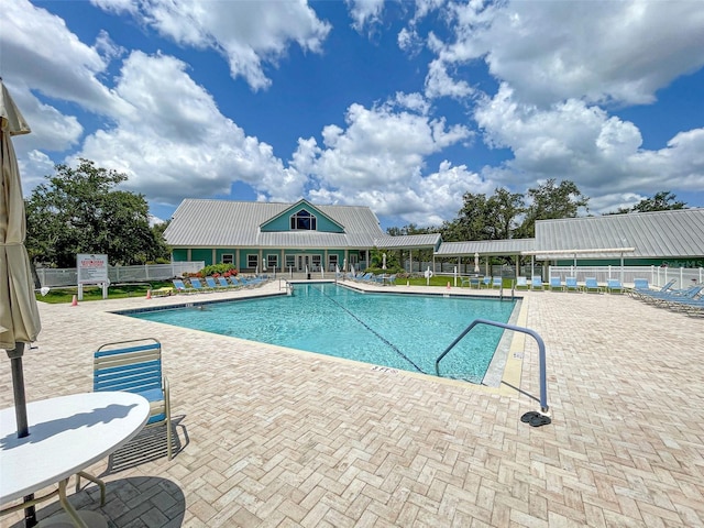 view of pool featuring a patio area