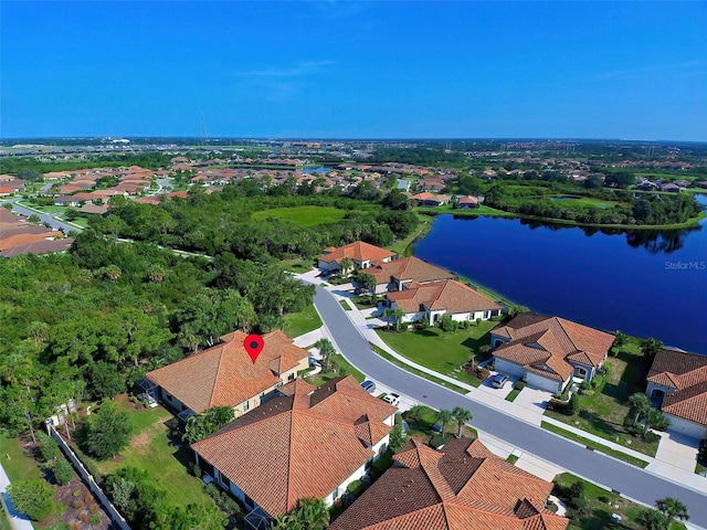 drone / aerial view with a water view