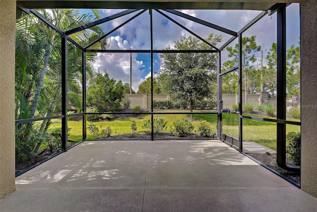 unfurnished sunroom featuring a healthy amount of sunlight