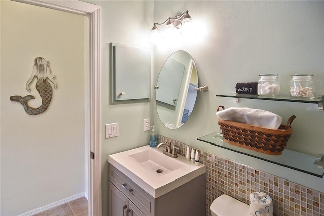 bathroom featuring vanity, tile patterned flooring, tasteful backsplash, and tile walls