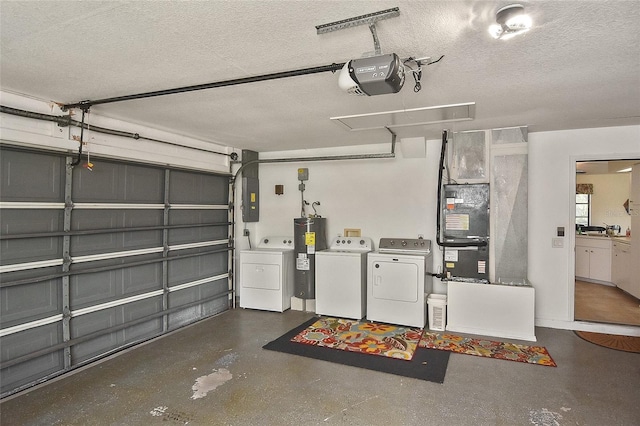 garage with washer and clothes dryer, electric panel, a garage door opener, electric water heater, and sink