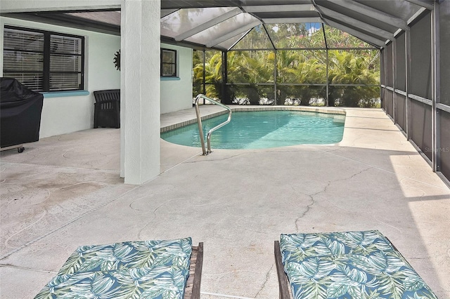 view of pool featuring a patio area, a lanai, and grilling area