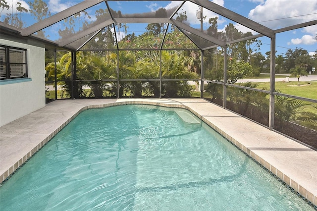 view of pool featuring a lanai