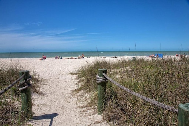 view of water feature with a beach view