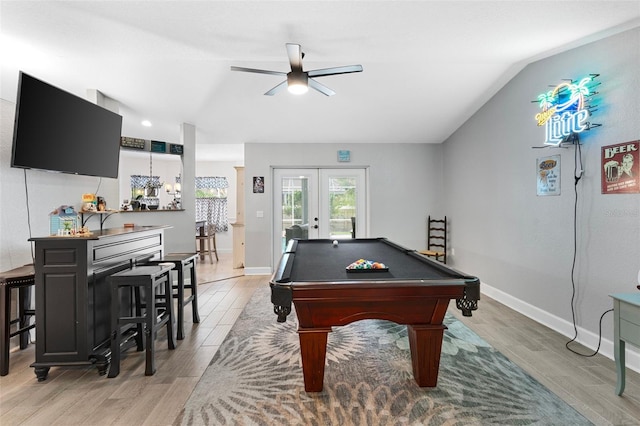 playroom featuring french doors, pool table, vaulted ceiling, light hardwood / wood-style floors, and ceiling fan