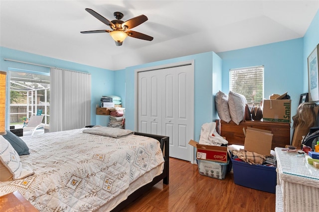 bedroom with a closet, ceiling fan, and hardwood / wood-style floors