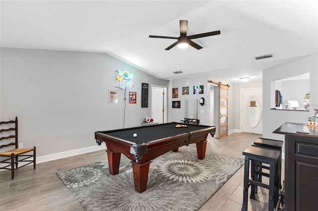 playroom featuring light hardwood / wood-style flooring, a barn door, ceiling fan, lofted ceiling, and billiards