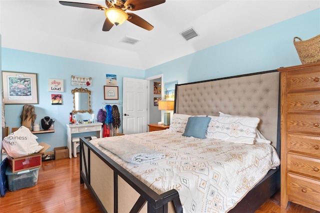 bedroom featuring dark hardwood / wood-style floors and ceiling fan