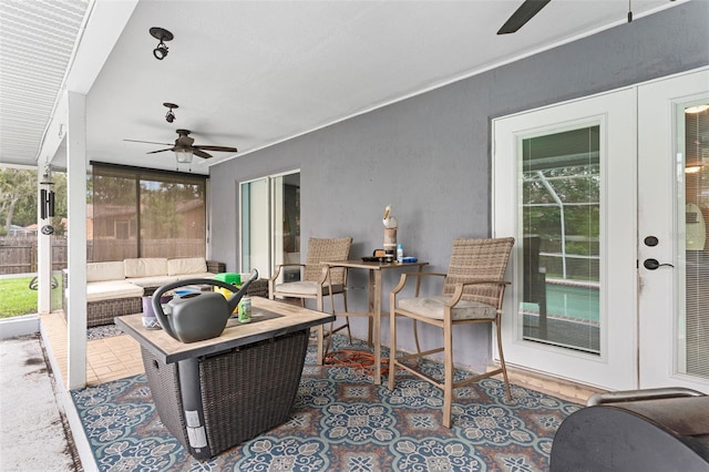 view of patio featuring ceiling fan and an outdoor hangout area