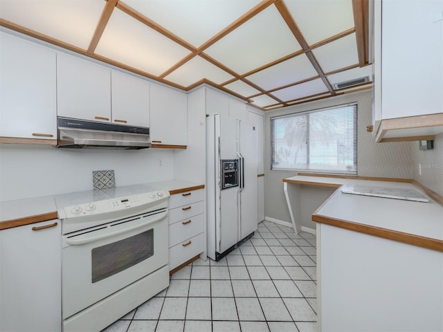 kitchen featuring white cabinetry, white appliances, and light tile patterned floors