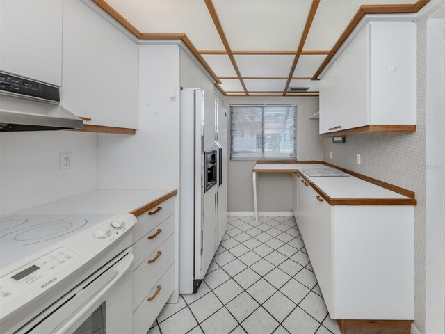 kitchen featuring range, white cabinets, white refrigerator with ice dispenser, range hood, and light tile patterned floors