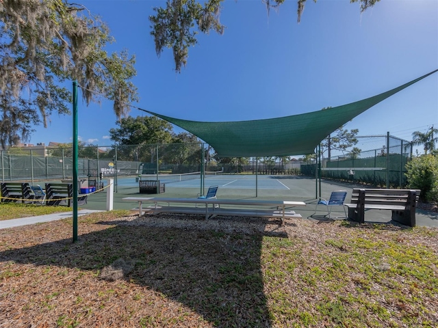 view of yard with tennis court