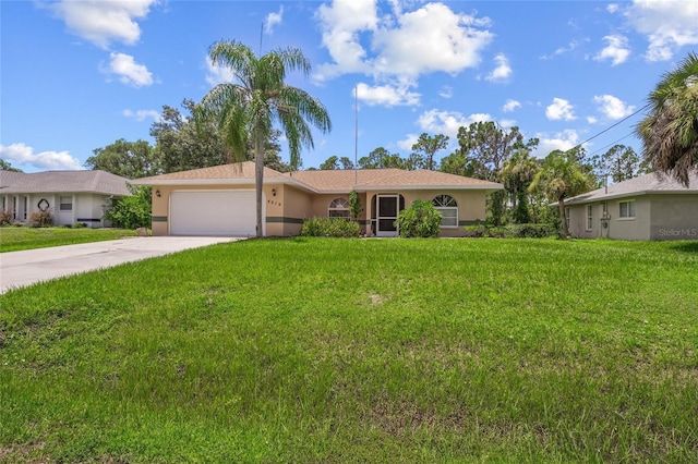 ranch-style home with a garage and a front lawn