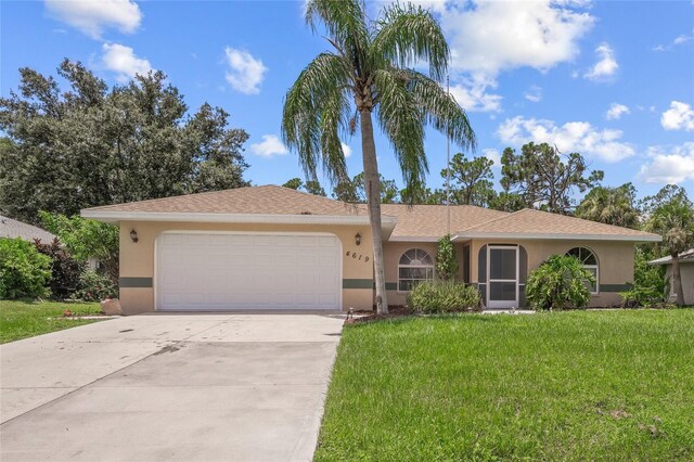 single story home with a garage and a front yard