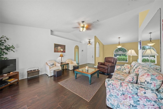 living room with ceiling fan, dark hardwood / wood-style floors, and lofted ceiling