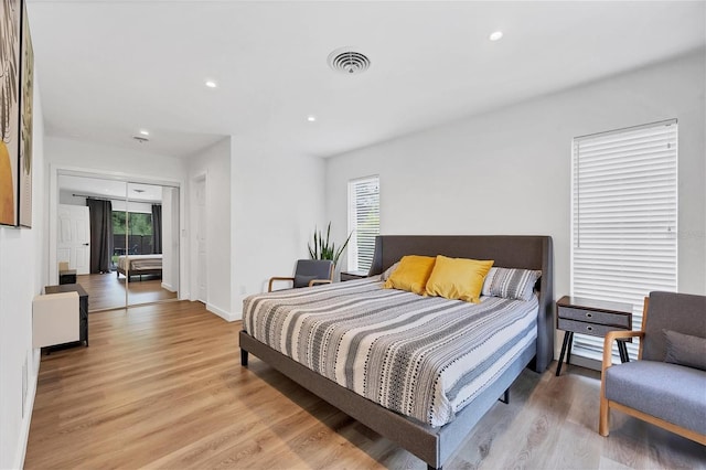 bedroom with light hardwood / wood-style flooring