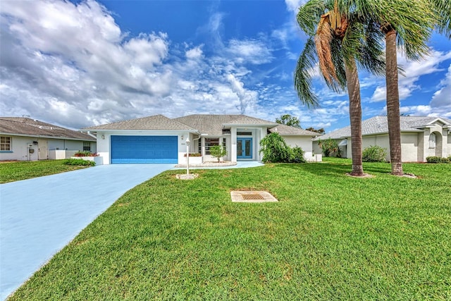 view of front of home with french doors, a front lawn, and a garage