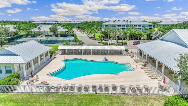 view of swimming pool with a patio