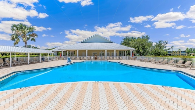 view of swimming pool with a patio area