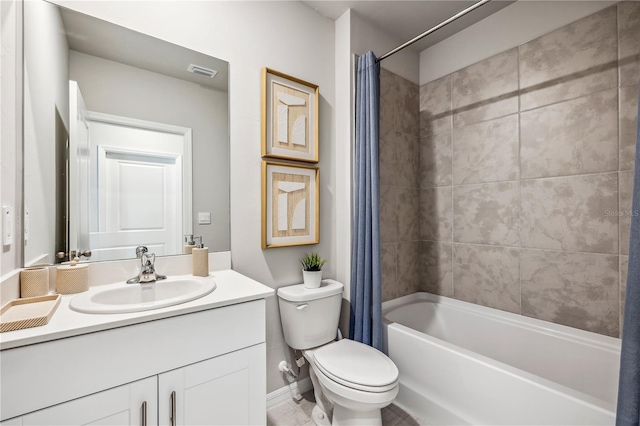 full bathroom featuring toilet, vanity, and shower / bathtub combination with curtain