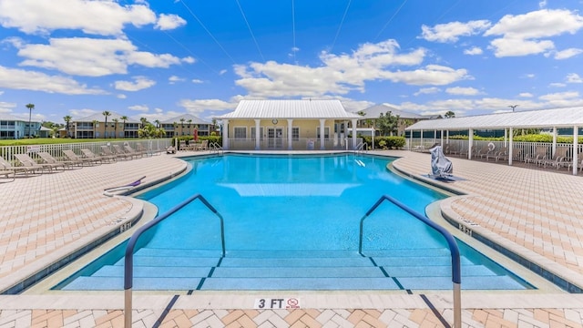 view of pool featuring a patio