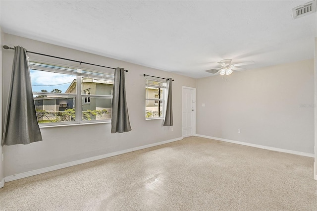 unfurnished room with ceiling fan