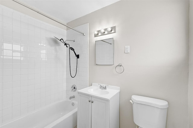 full bathroom with vanity, toilet, and tiled shower / bath