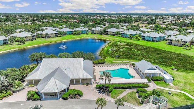 aerial view with a water view and a residential view