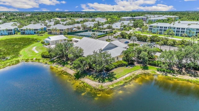 bird's eye view featuring a water view and a residential view