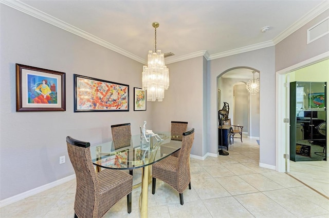 tiled dining area with crown molding and a chandelier