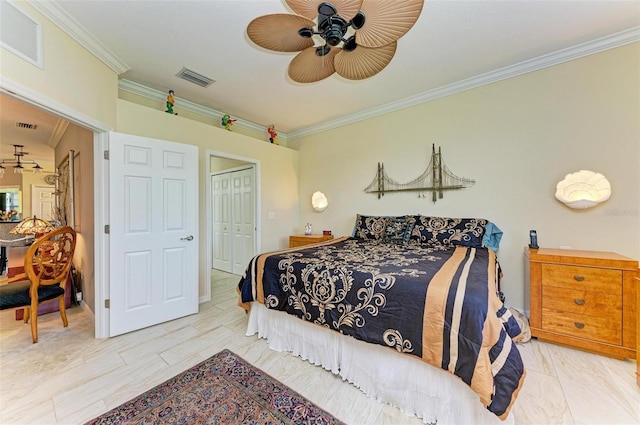 bedroom with ornamental molding, a closet, and ceiling fan