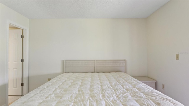 bedroom with a textured ceiling