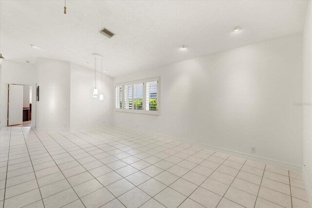 empty room featuring light tile patterned floors