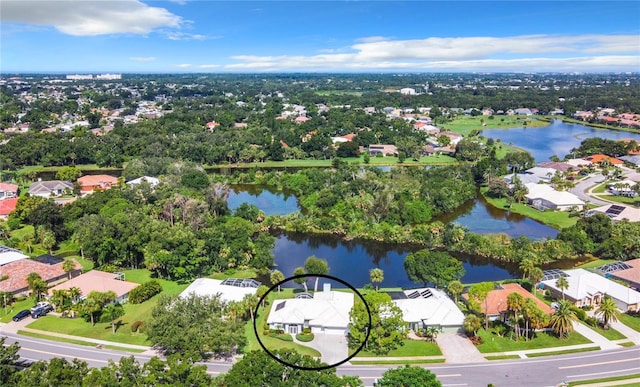 birds eye view of property featuring a water view