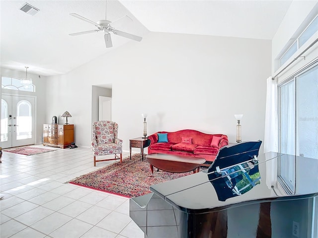 living room with french doors, ceiling fan, high vaulted ceiling, and light tile patterned floors