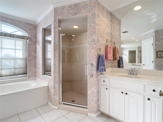 bathroom with crown molding, tile patterned flooring, vanity, a textured ceiling, and shower with separate bathtub