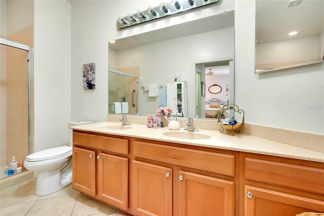 bathroom featuring tile patterned flooring, ensuite bath, a sink, and a stall shower