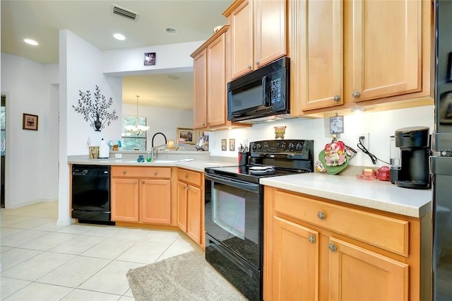 kitchen featuring light tile patterned floors, a sink, visible vents, light countertops, and black appliances