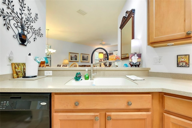 kitchen with light countertops, hanging light fixtures, visible vents, a sink, and dishwasher