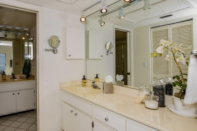 bathroom featuring vanity and tile patterned floors