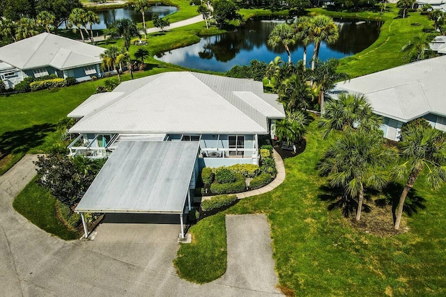 birds eye view of property featuring a water view