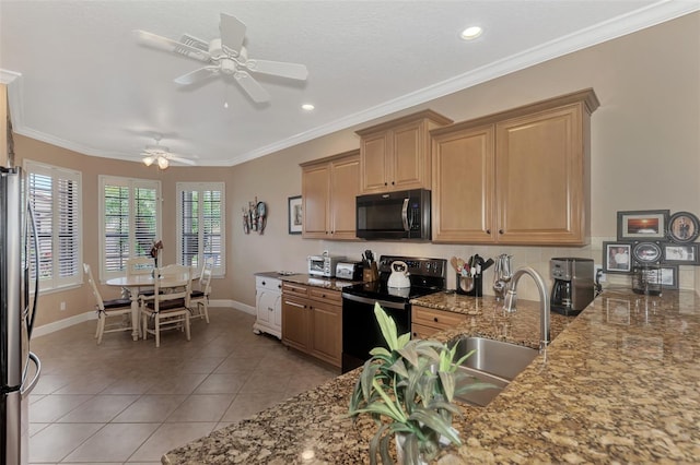 kitchen featuring crown molding, light stone countertops, ceiling fan, light tile patterned flooring, and black appliances