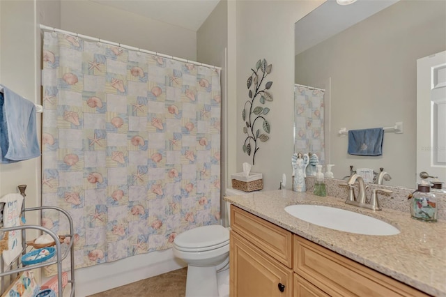 full bath featuring toilet, tile patterned flooring, shower / tub combo with curtain, and vanity