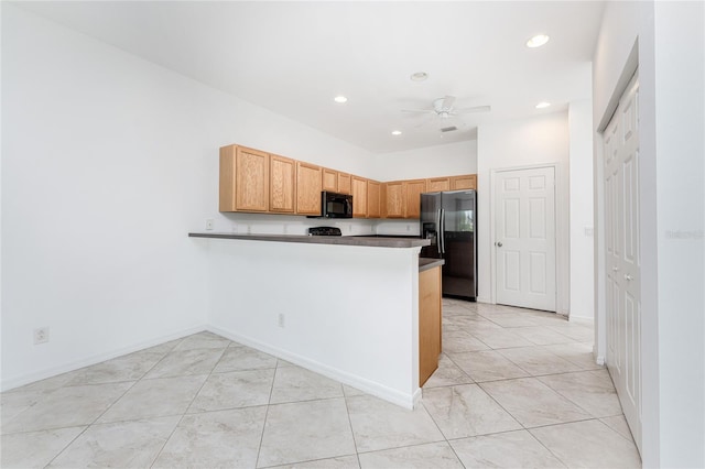 kitchen featuring ceiling fan, light tile patterned floors, kitchen peninsula, and black appliances